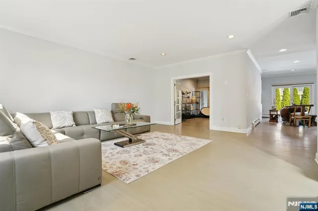 a living room with furniture and a table