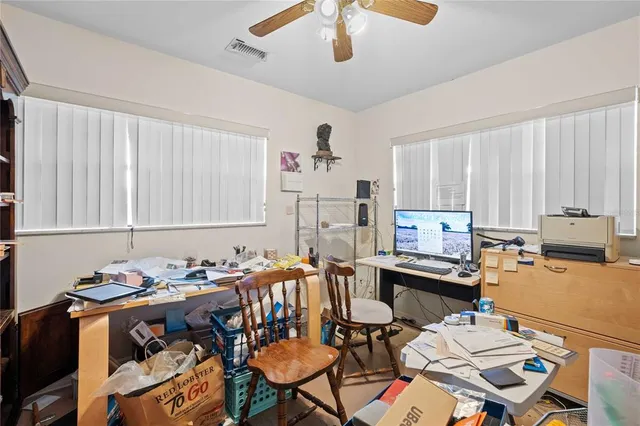a bathroom with a sink vanity tub and a mirror