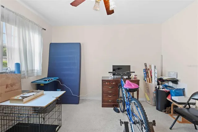 a workspace with furniture and a chandelier