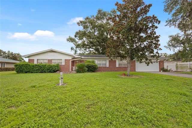 a house view with a garden space
