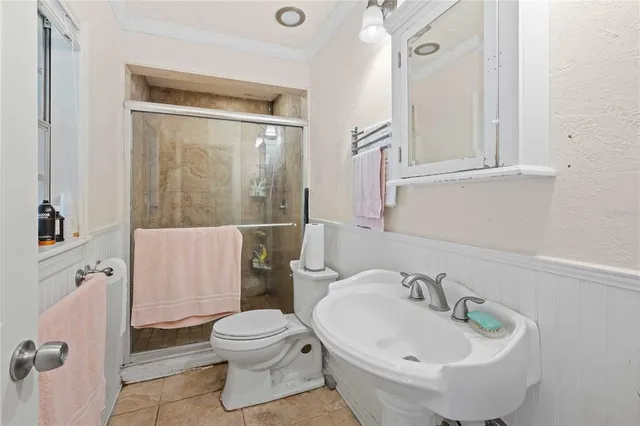 a view of a room with swing and chairs