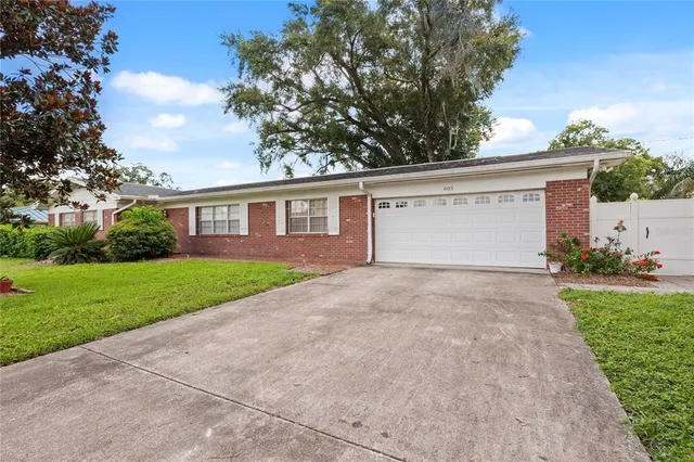 a view of outdoor space yard and front view of a house