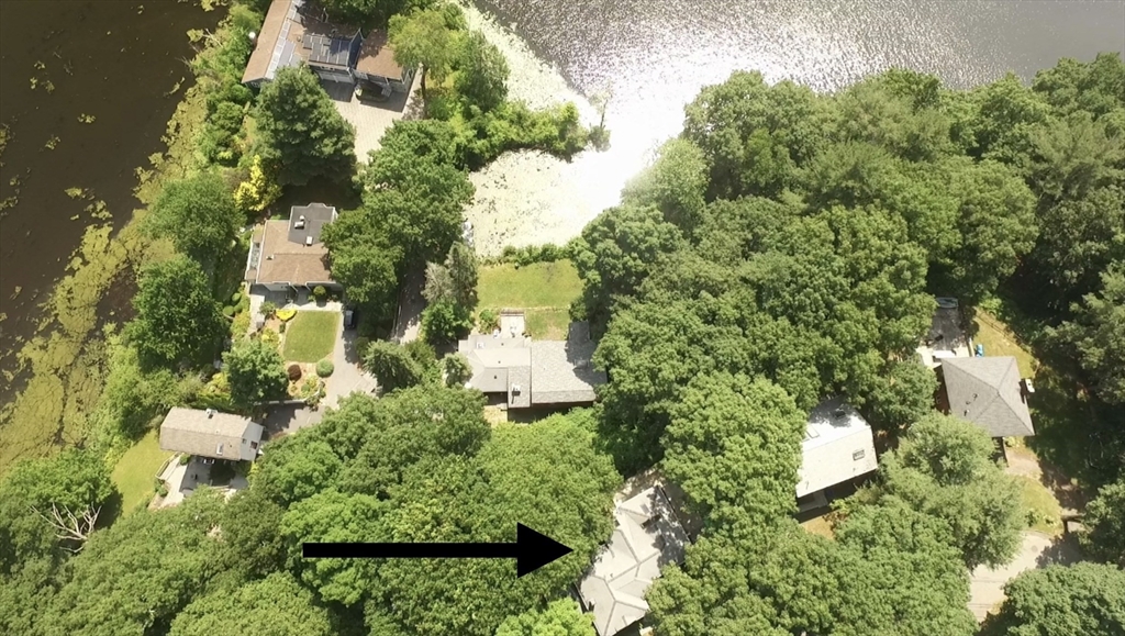 20 Morses Pond Road Natick, MA 01760 - Photo 12 of 15 an aerial view of a house with a yard and garden