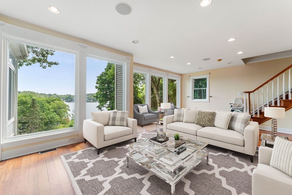 20 Morses Pond Road Natick, MA 01760 - Photo 3 of 15 a living room with furniture and a large window