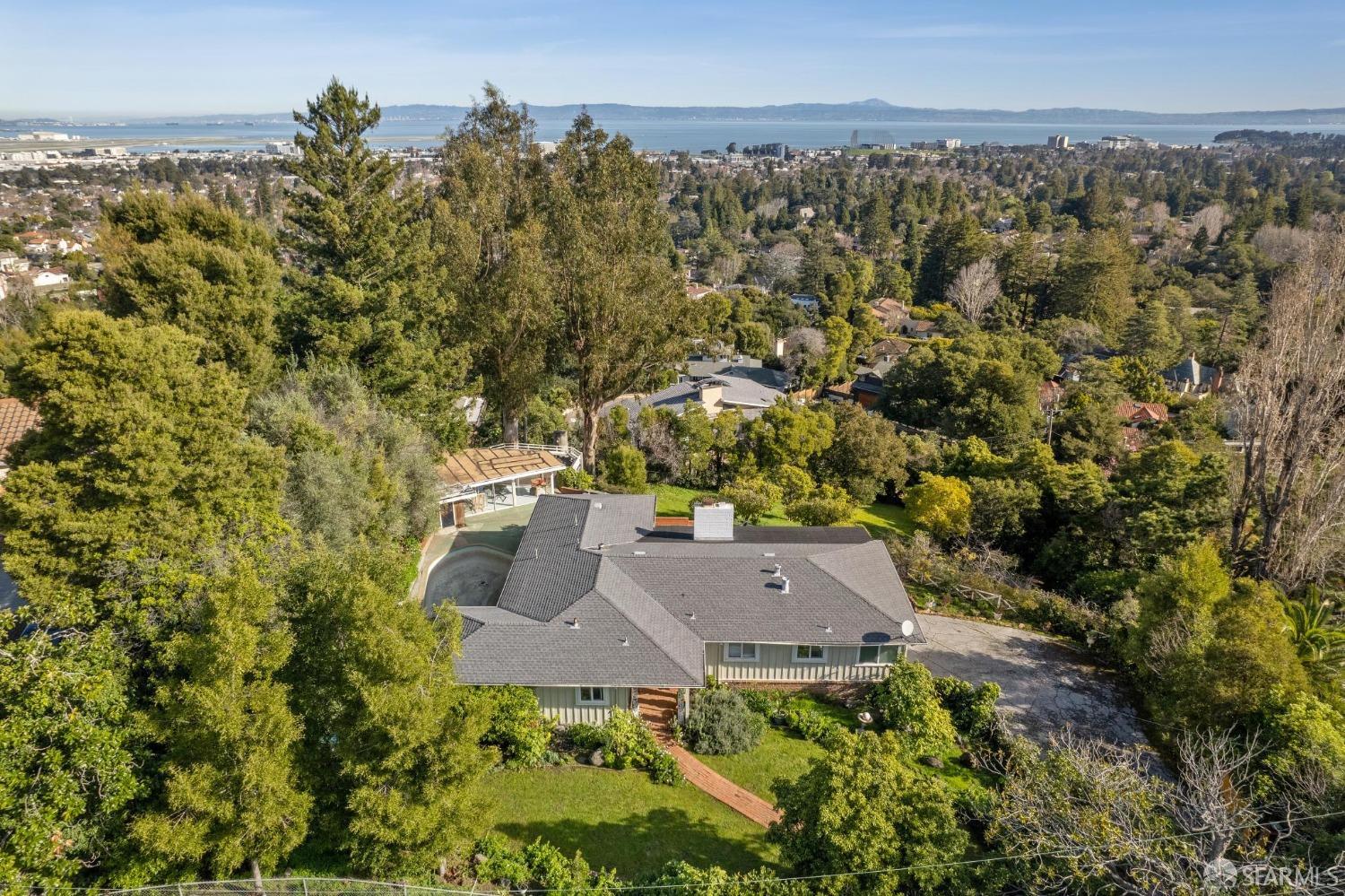 2480 Summit Drive Hillsborough, CA 94010 - Photo 4 of 12 an aerial view of a house with a yard