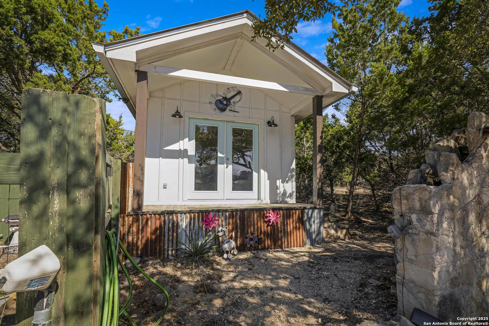 15090 Highway 46 Spring Branch, TX 78070 - Photo 25 of 71 a front view of a house with a yard