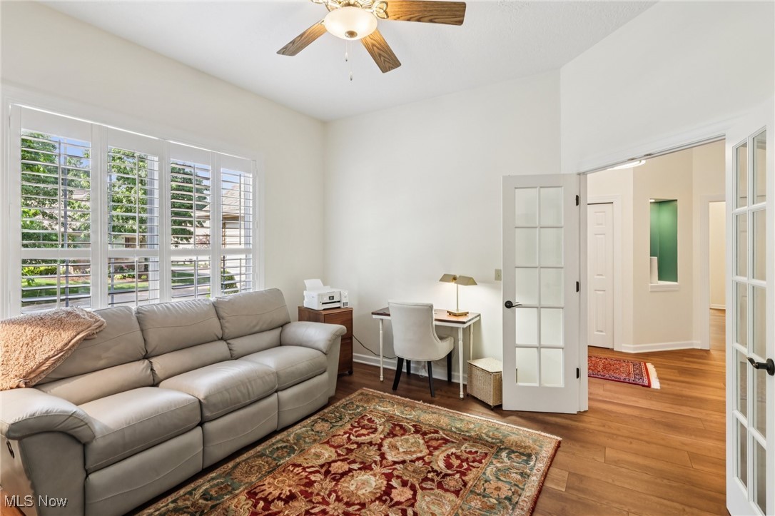 249 Granger Road, Unit 87 Medina, OH 44256 - Photo 17 of 38 Family room with a ceiling fan and wood finished floors