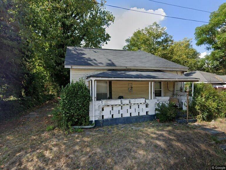 a view of a house with garden