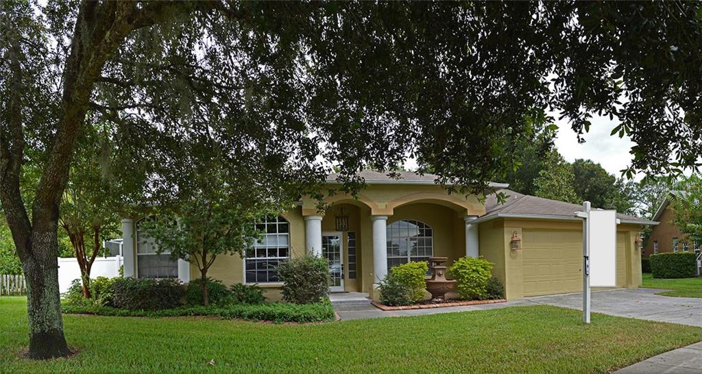 12152 Penzance Lane New Port Richey, FL 34654 - Photo 1 of 1 front view of a house with a yard