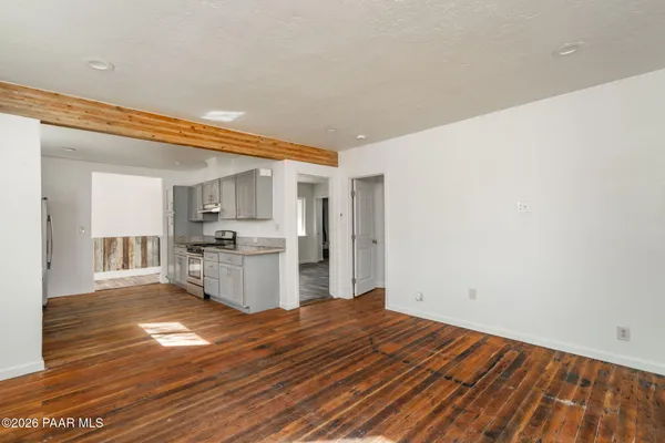 a view of kitchen with wooden floor