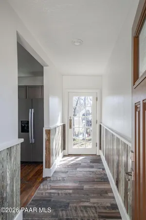 a view interior of a house with wooden floor and fireplace