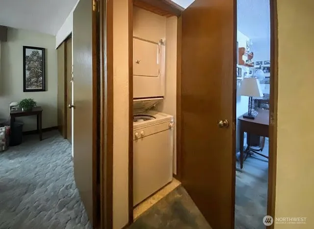 a view of a bathroom from the hallway