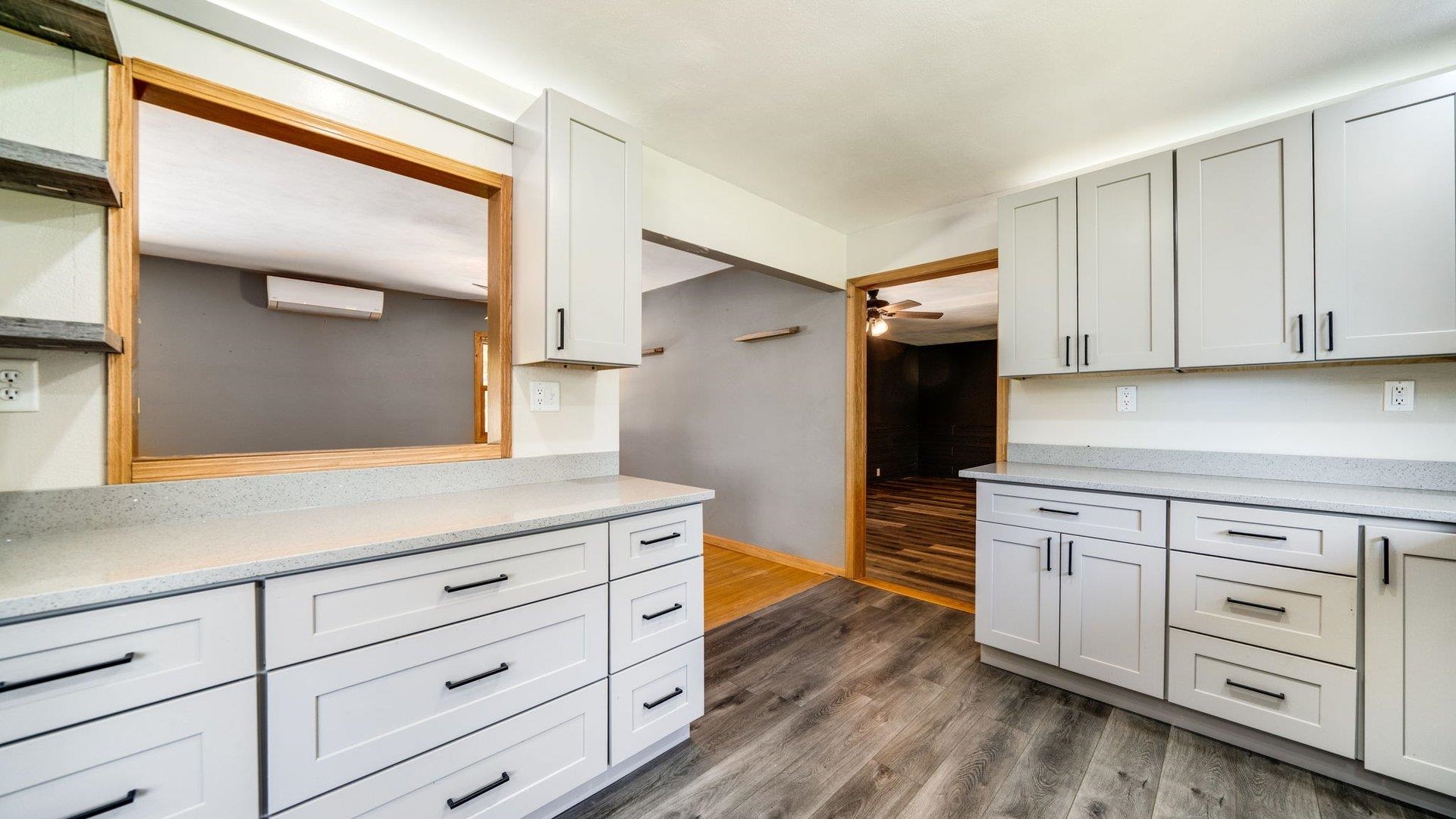 313 West Margaret Fuller Road Oregon, IL 61061 - Photo 8 of 46 a kitchen with cabinets appliances and a wooden floor