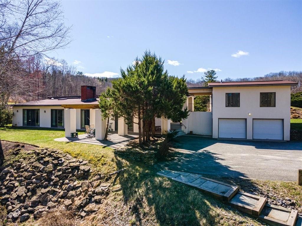 7 Green Road Amenia, NY 12501 - Photo 1 of 1 a front view of house with yard and trees in the background