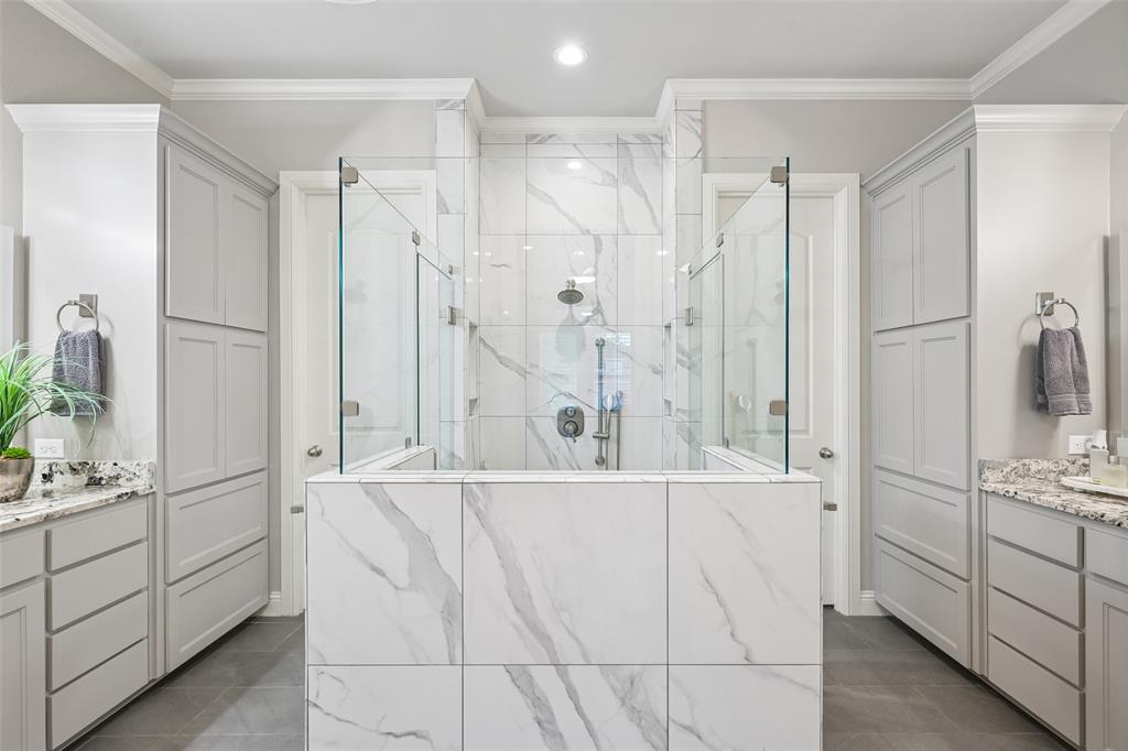1657 Florence Road Keller, TX 76262 - Photo 18 of 40 a bathroom with a double vanity sink mirror and shower