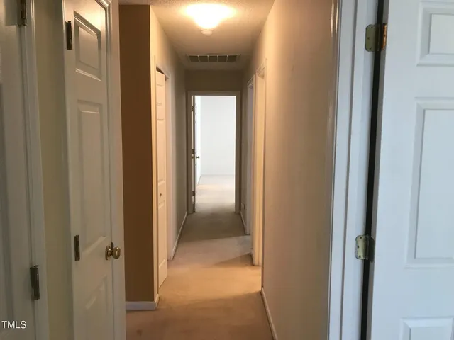 a view of a hallway with a elevator