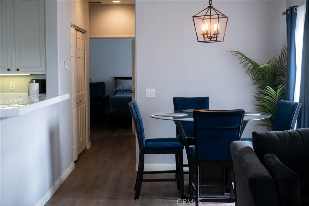 7331 Shelby Place Rancho Cucamonga, CA 91739 - Photo 7 of 17 a view of a dining room with furniture and a chandelier