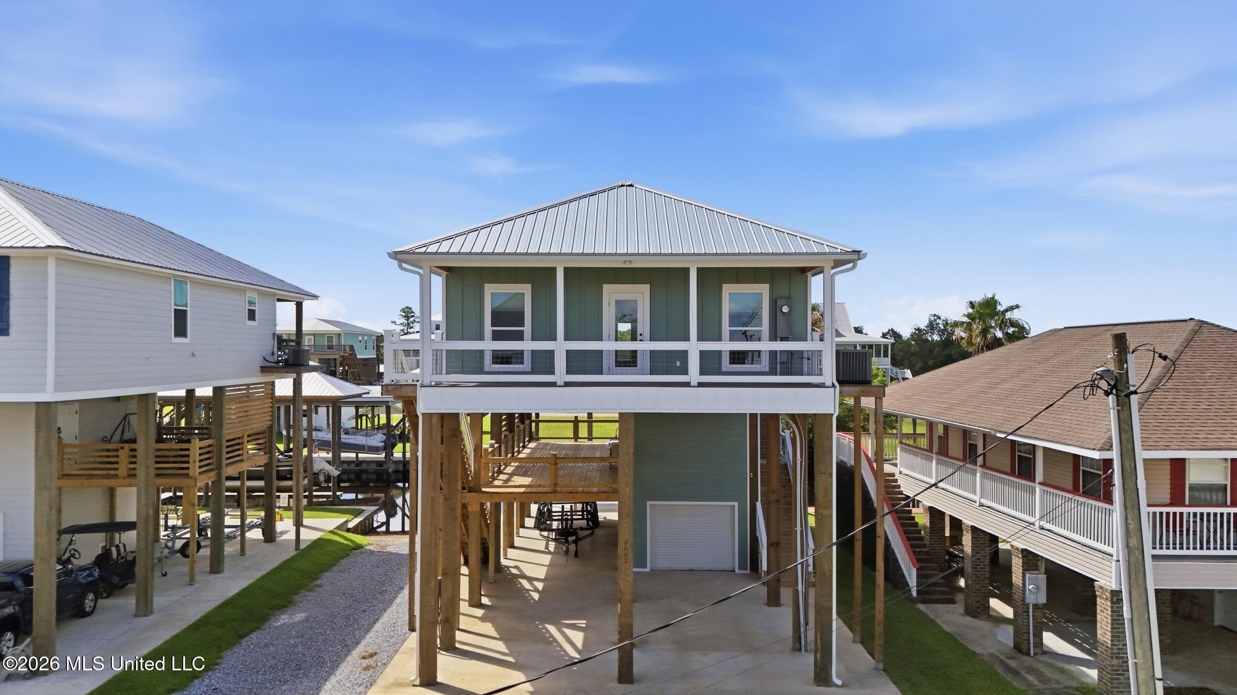 4062 Devon Street Bay St. Louis, MS 39520 - Photo 3 of 70 3_dji_20260611101644_0708_d