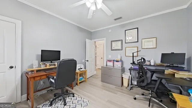 a bedroom with bed and a window