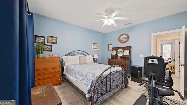 a bathroom with a sink toilet a mirror and shower