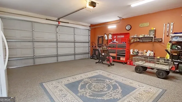a view of a livingroom with furniture and a window