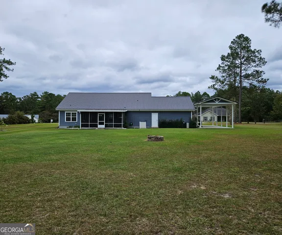 a view of a large trees with a big yard