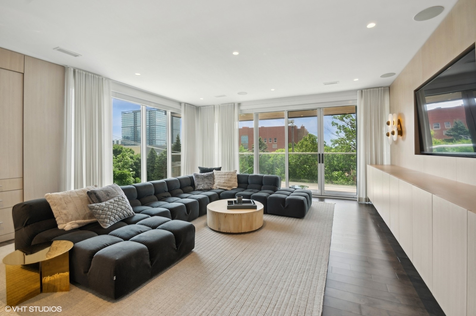1625 North Burling Street, Unit 401 Chicago, IL 60614 - Photo 12 of 42 a living room with furniture and a large window
