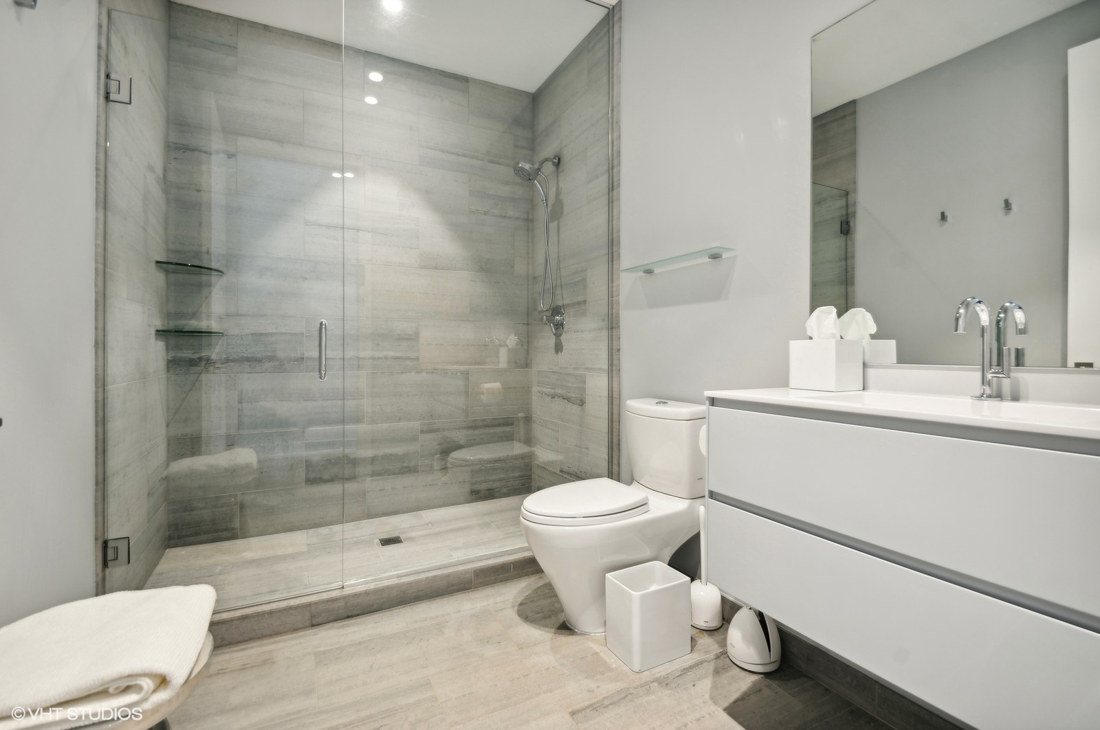 1625 North Burling Street, Unit 401 Chicago, IL 60614 - Photo 27 of 42 a bathroom with a sink toilet and shower
