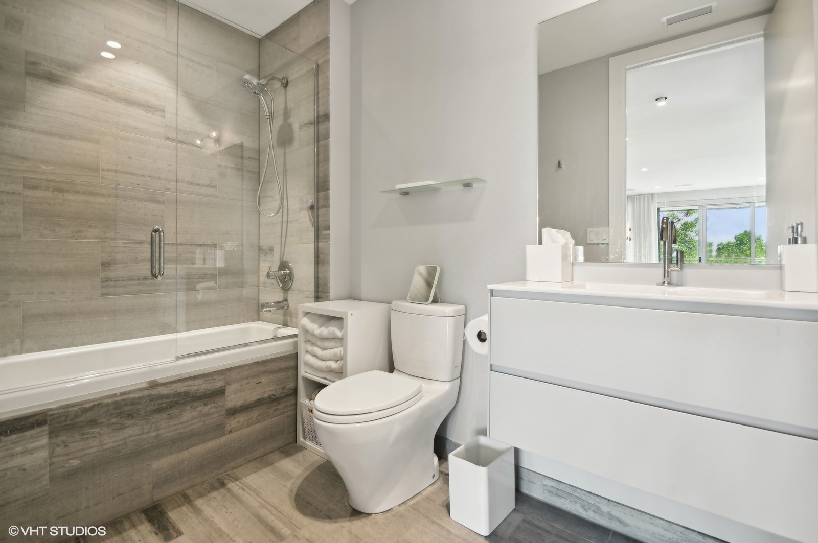 1625 North Burling Street, Unit 401 Chicago, IL 60614 - Photo 29 of 42 a bathroom with a sink toilet and shower