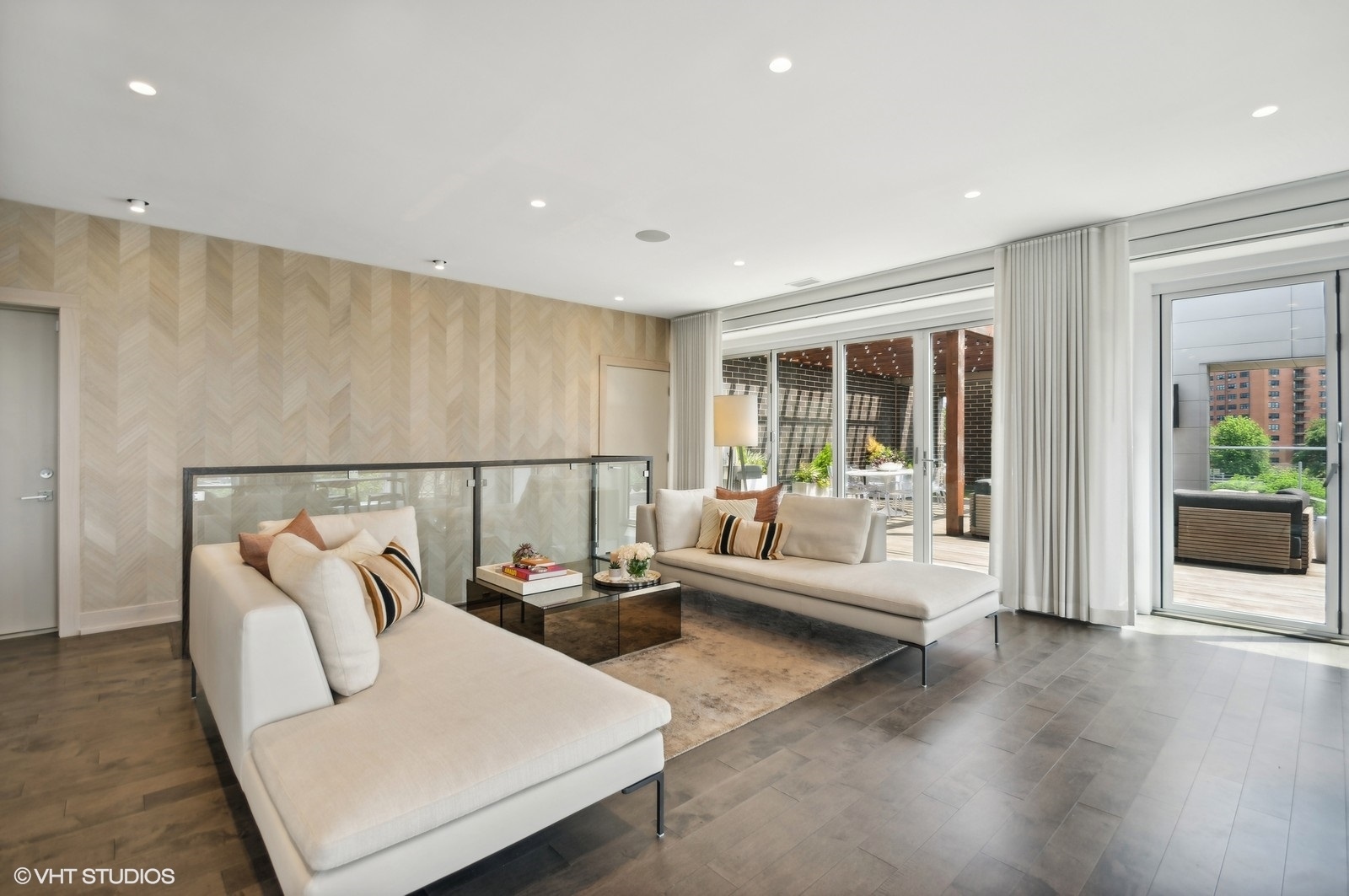 1625 North Burling Street, Unit 401 Chicago, IL 60614 - Photo 3 of 42 a living room with furniture and a large window