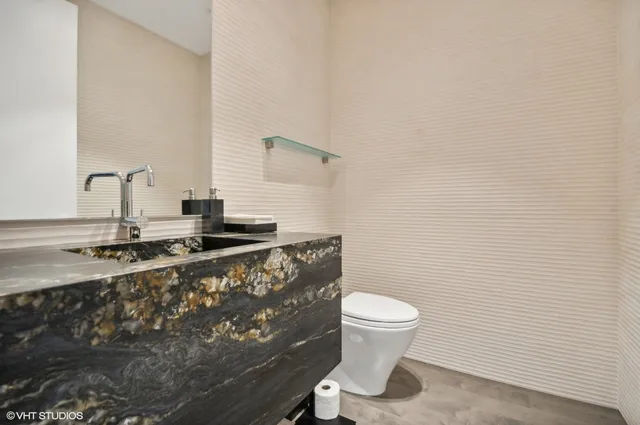 a bathroom with a sink and a toilet