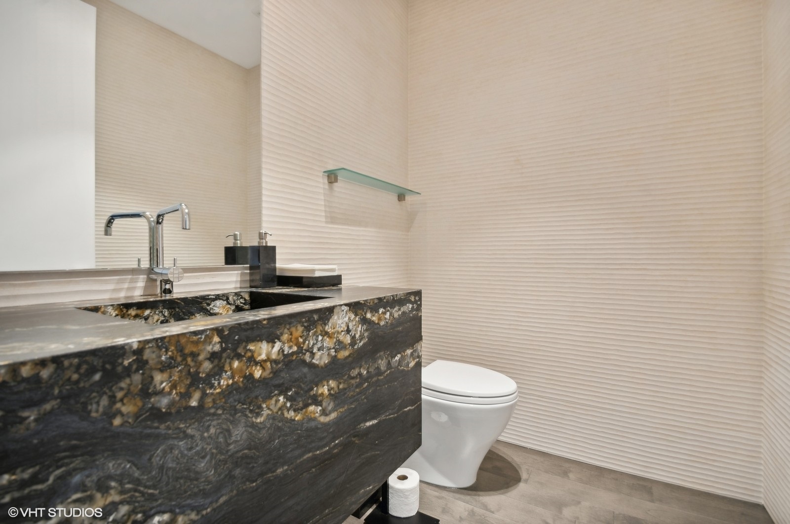 1625 North Burling Street, Unit 401 Chicago, IL 60614 - Photo 31 of 42 a bathroom with a sink and a toilet