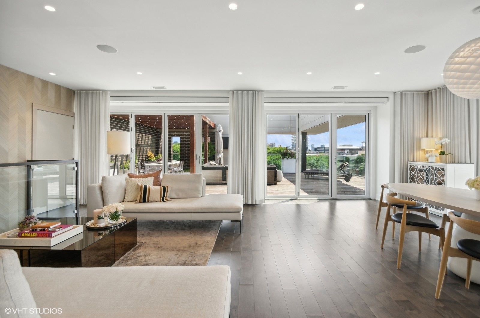 1625 North Burling Street, Unit 401 Chicago, IL 60614 - Photo 4 of 42 a living room with furniture and a large window