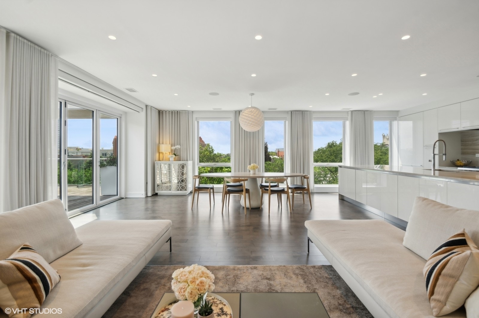 1625 North Burling Street, Unit 401 Chicago, IL 60614 - Photo 5 of 42 a living room with furniture wooden floor and a large window