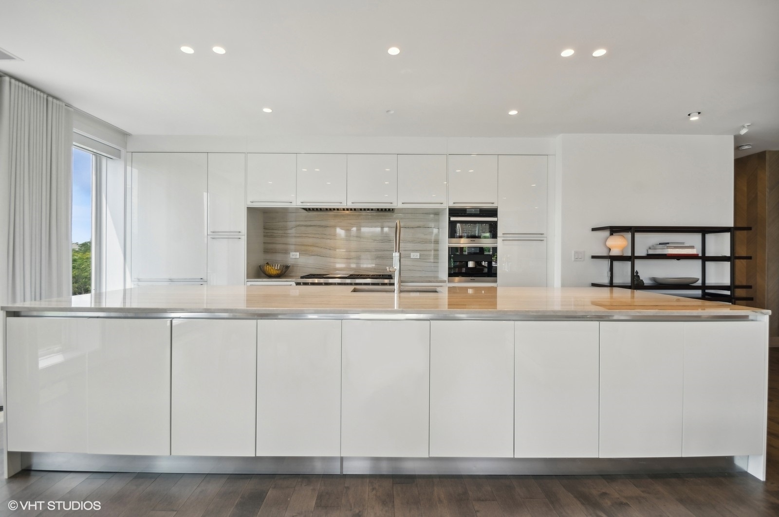 1625 North Burling Street, Unit 401 Chicago, IL 60614 - Photo 6 of 42 a kitchen with counter top space cabinets and appliances