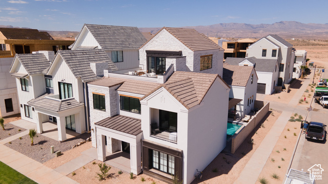 5339 Cyan Lane St. George, UT 84790 - Photo 3 of 44 View of front of home featuring a residential view, a mountain view, a standing seam roof, and a metal roof