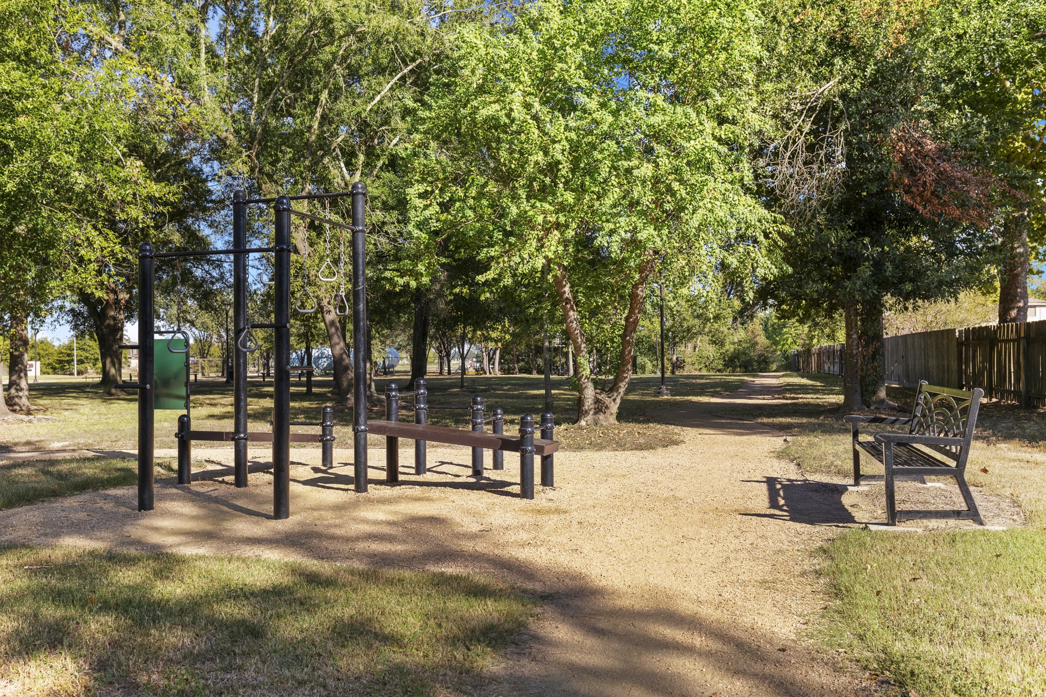 23826 Lestergate Drive Spring, TX 77373 - Photo 43 of 45 Birnam Wood’s outdoor amenities continue with a shaded playground and open green space, giving the neighborhood another easy place to spend time outside. Mature trees surround the area, creating a relaxed community setting for play, fresh air, and everyday time close to home.