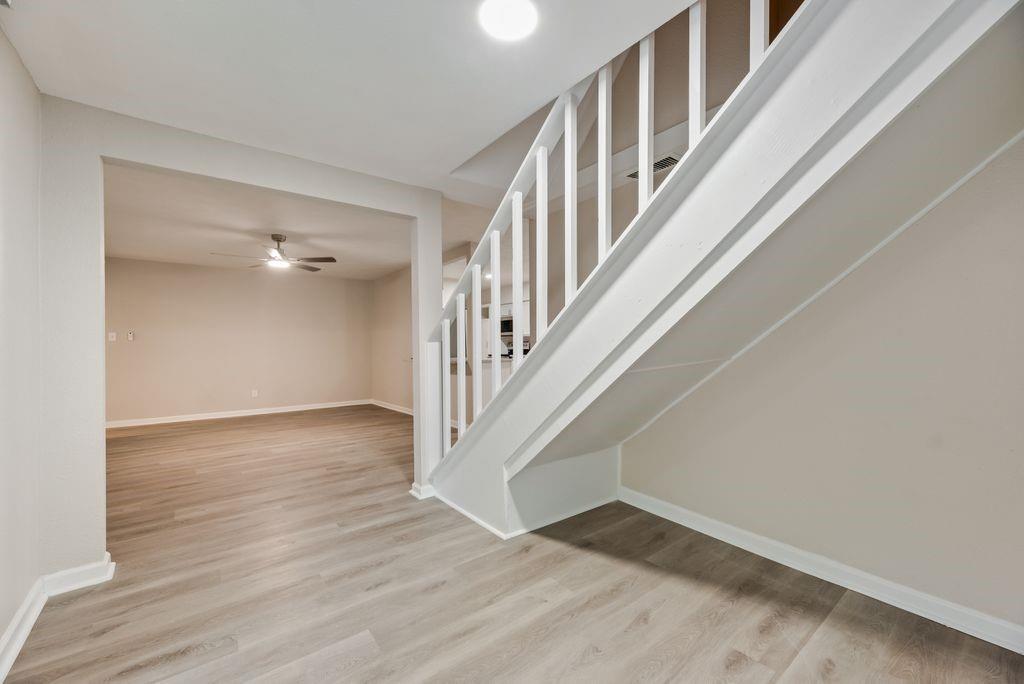 5706 Rocky Ridge Road Dallas, TX 75241 - Photo 10 of 31 a view of an entryway with wooden floor