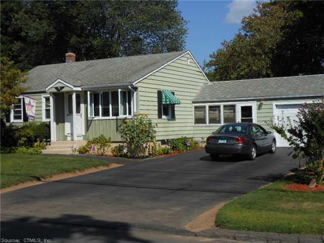 9 River Road East Haven, CT 06512 - Photo 1 of 1 front view of a house with a yard