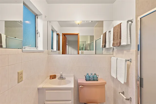 a bedroom with a bed and a cabinets