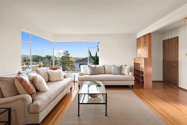 a living room with furniture and a couch