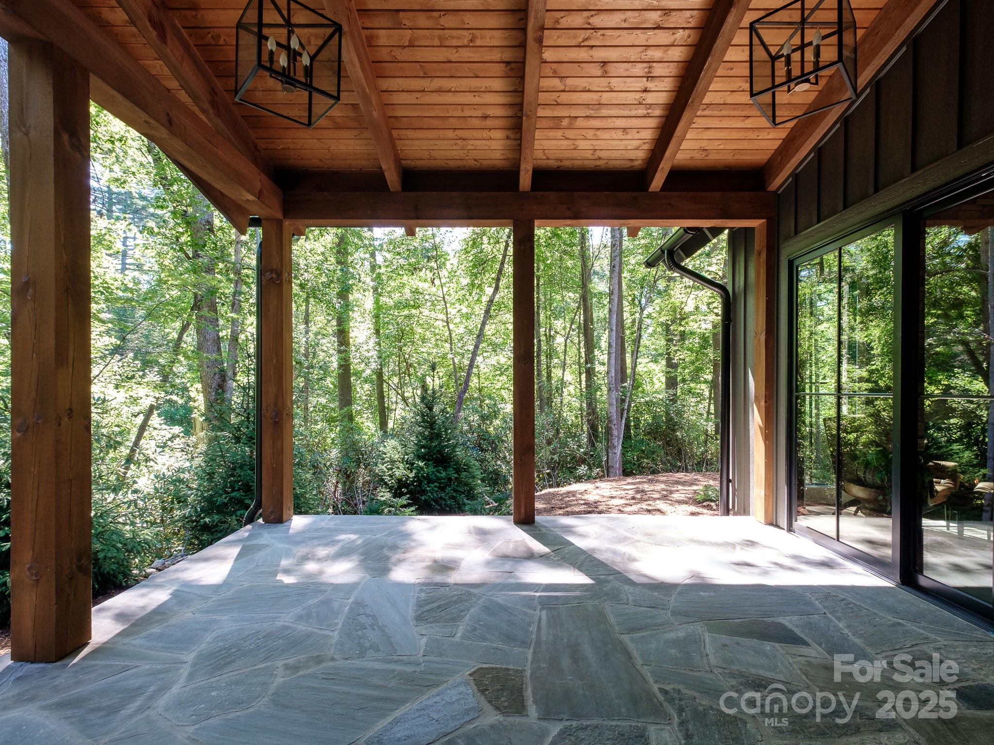 115 Rockbrook Overlook Brevard, NC 28712 - Photo 21 of 33 a view of a backyard with a large tree