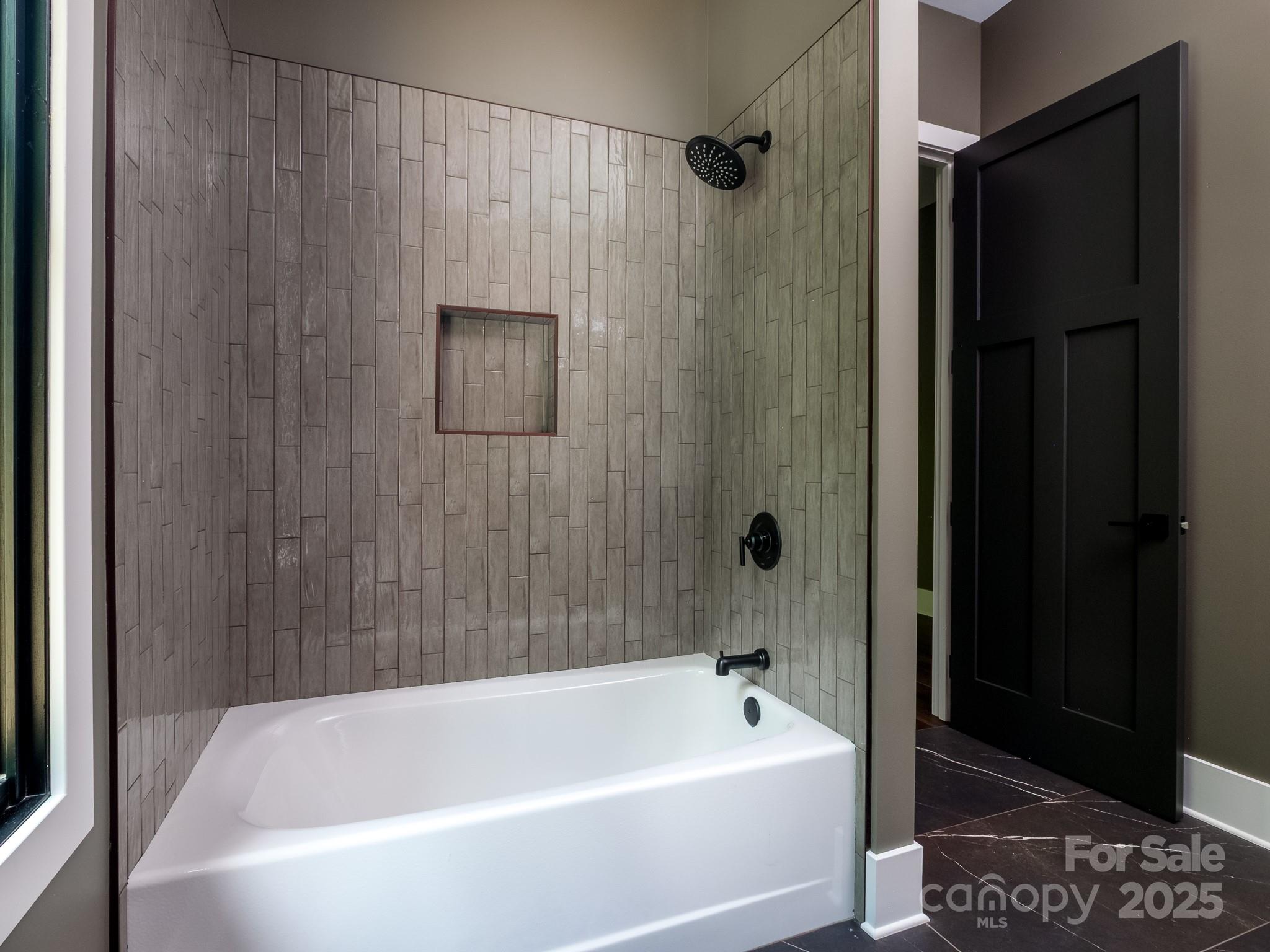 115 Rockbrook Overlook Brevard, NC 28712 - Photo 27 of 33 a bathroom with a bathtub and shower