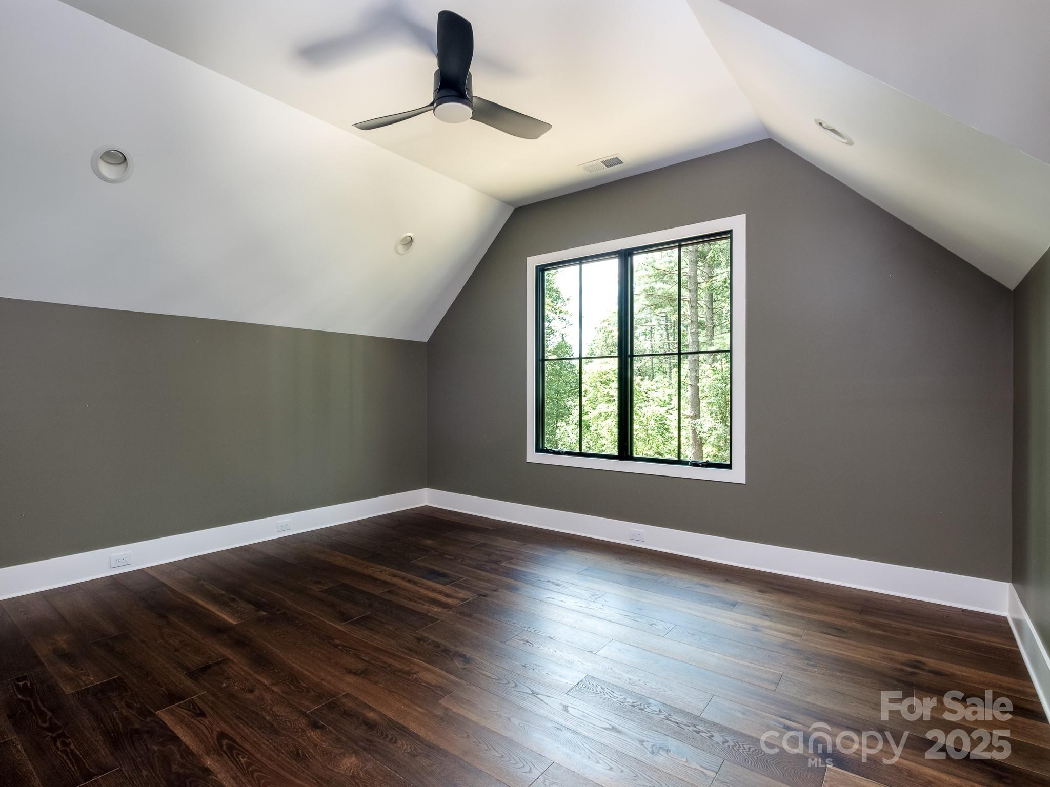 115 Rockbrook Overlook Brevard, NC 28712 - Photo 28 of 33 a view of an empty room with wooden floor and a window