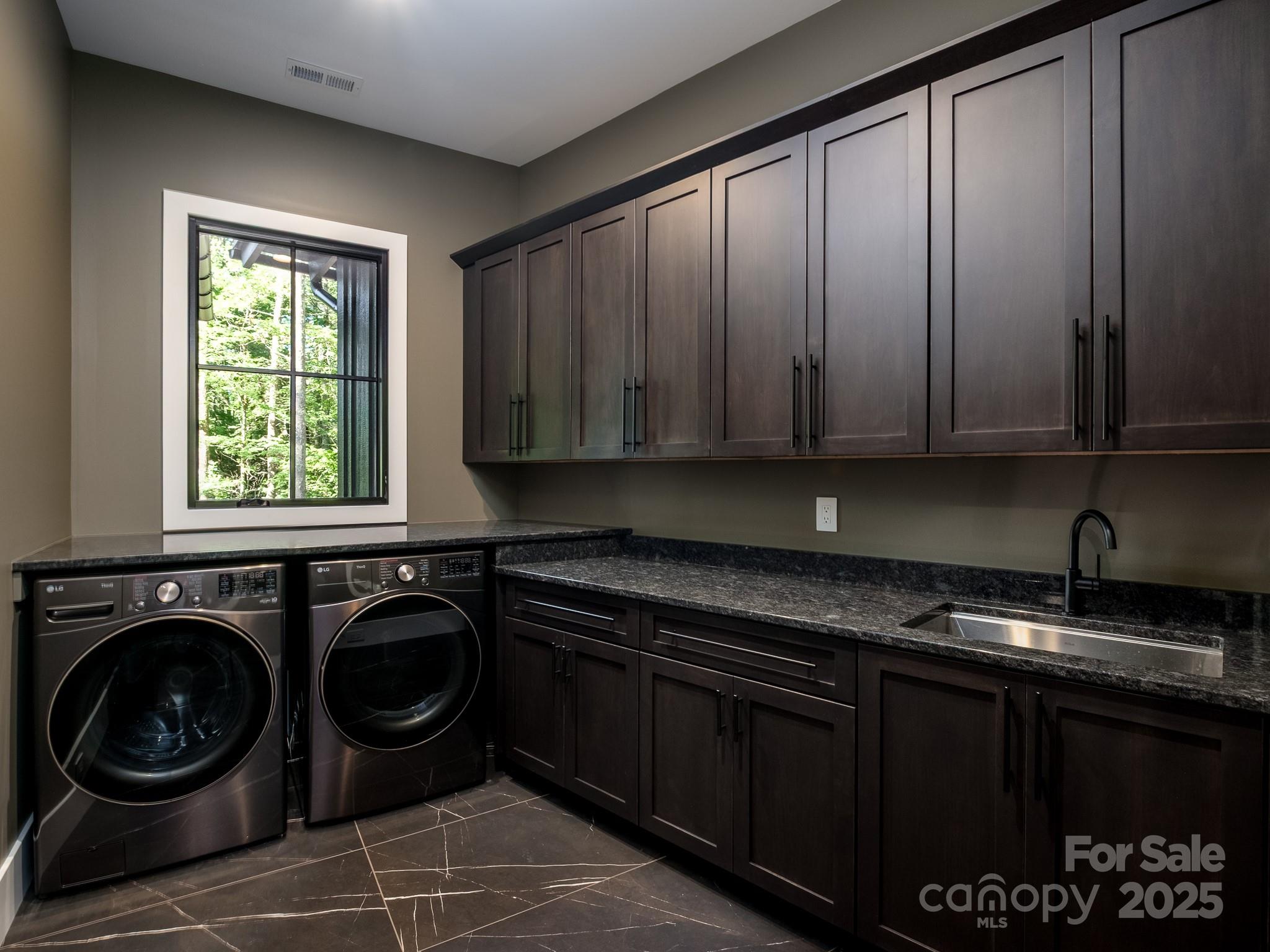 115 Rockbrook Overlook Brevard, NC 28712 - Photo 31 of 33 a view of a kitchen with washer and dryer
