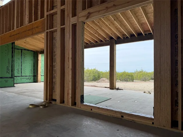 a backyard of a house with seating space