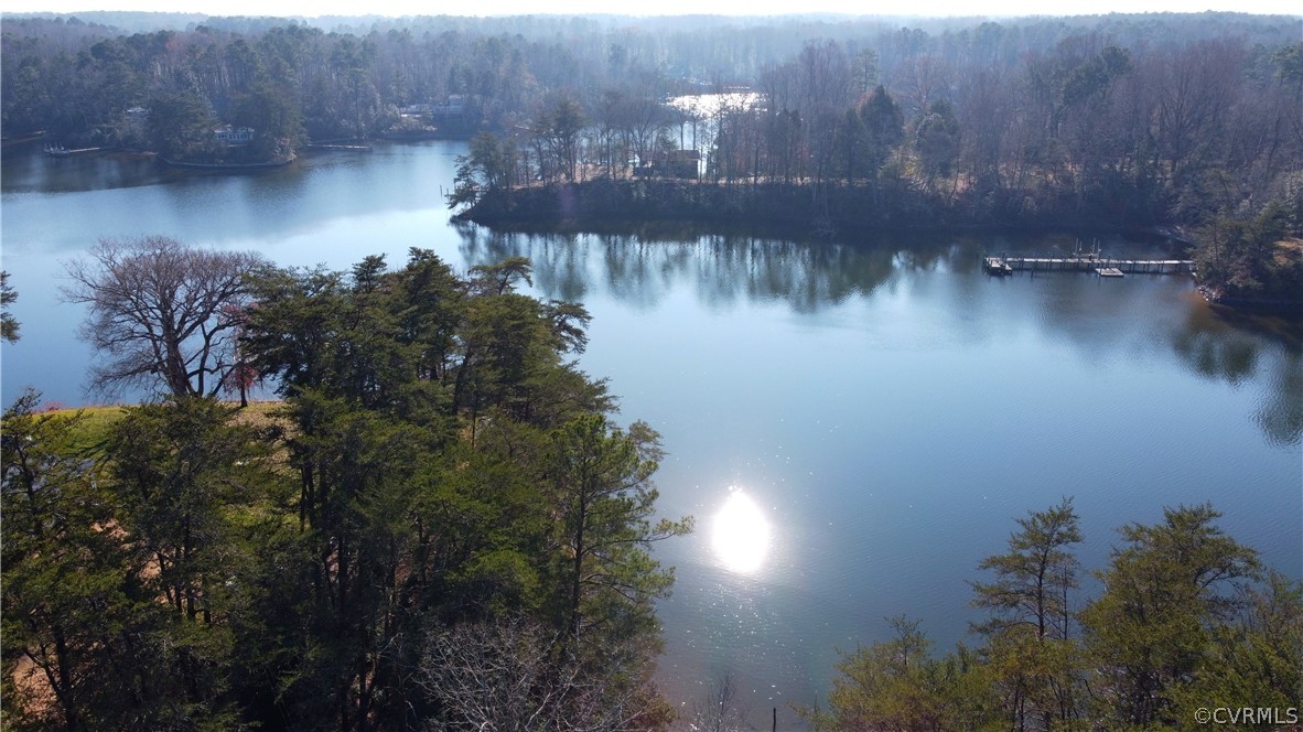A Level Green Road Lancaster, VA 22503 - Photo 1 of 10 a view of a lake from a yard