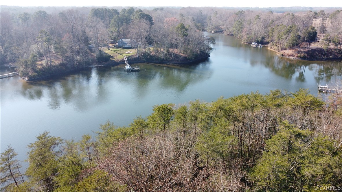 A Level Green Road Lancaster, VA 22503 - Photo 7 of 10 a view of a lake with trees by side of it