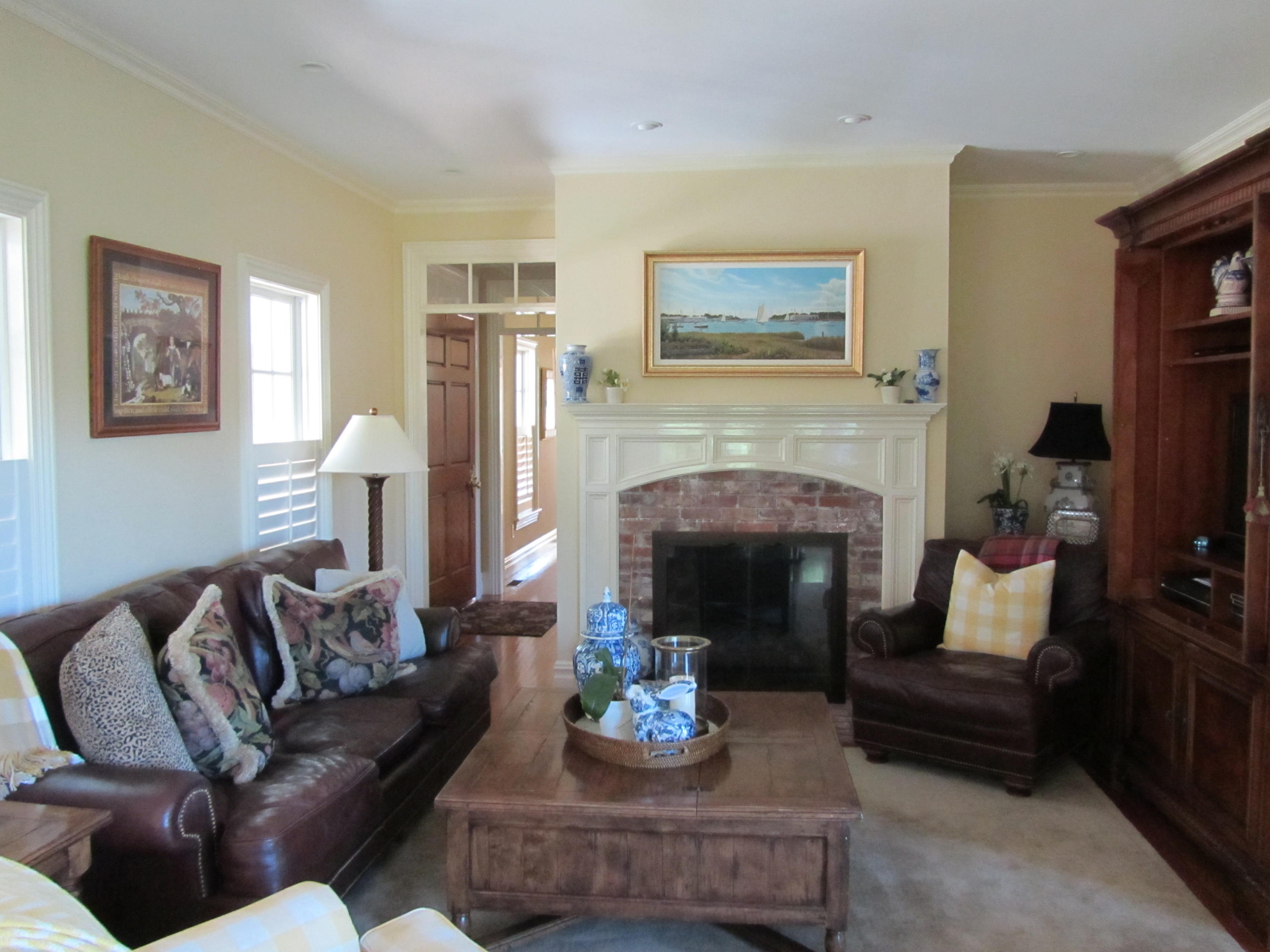 130 Main Street Osterville, MA 02655 - Photo 15 of 34 a living room with furniture and a fireplace