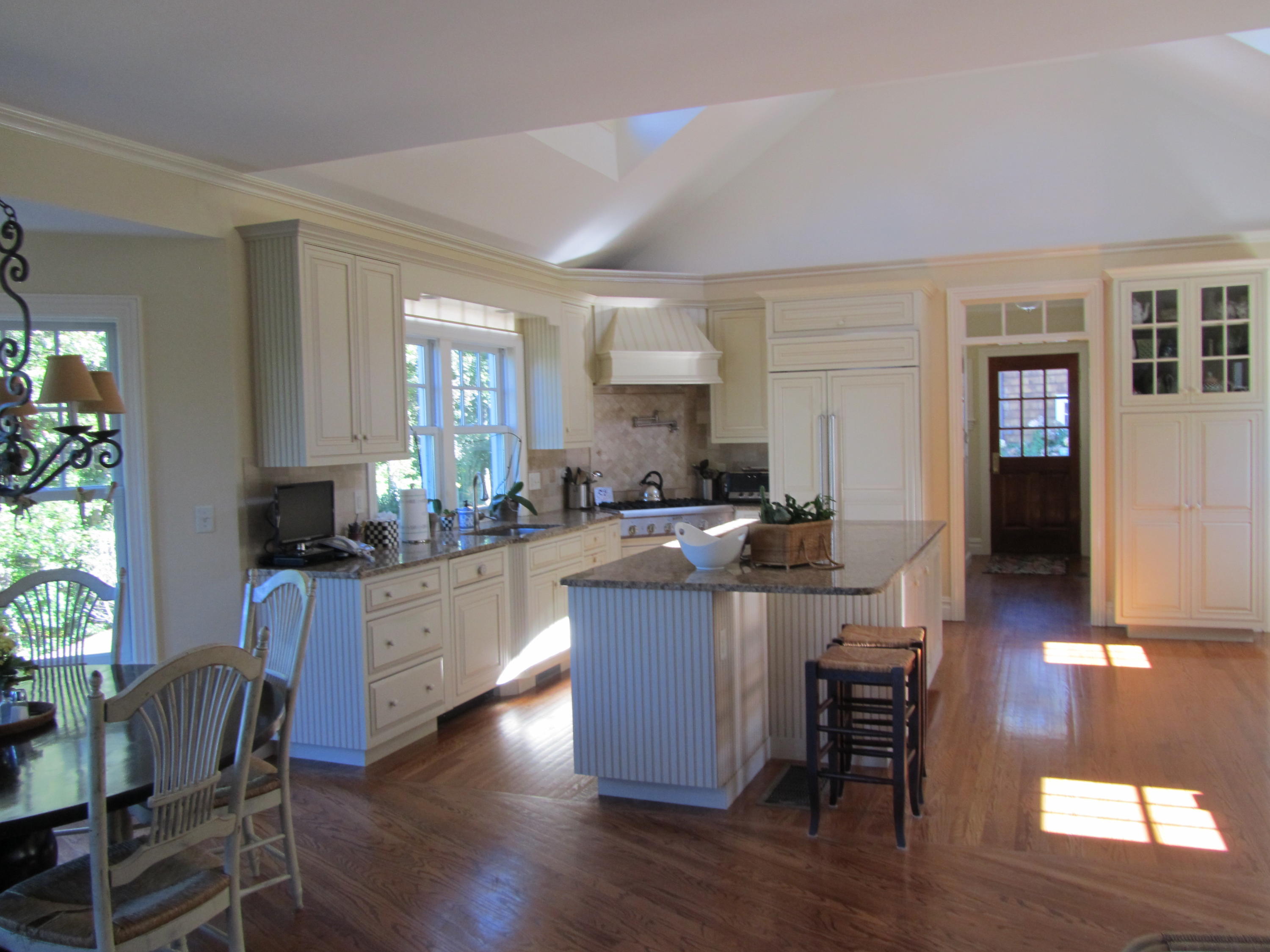 130 Main Street Osterville, MA 02655 - Photo 18 of 34 a kitchen with a sink cabinets and wooden floor